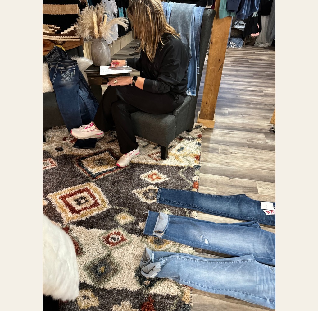Buyer recording denim style selections — a buying session at the OnesGolden studio