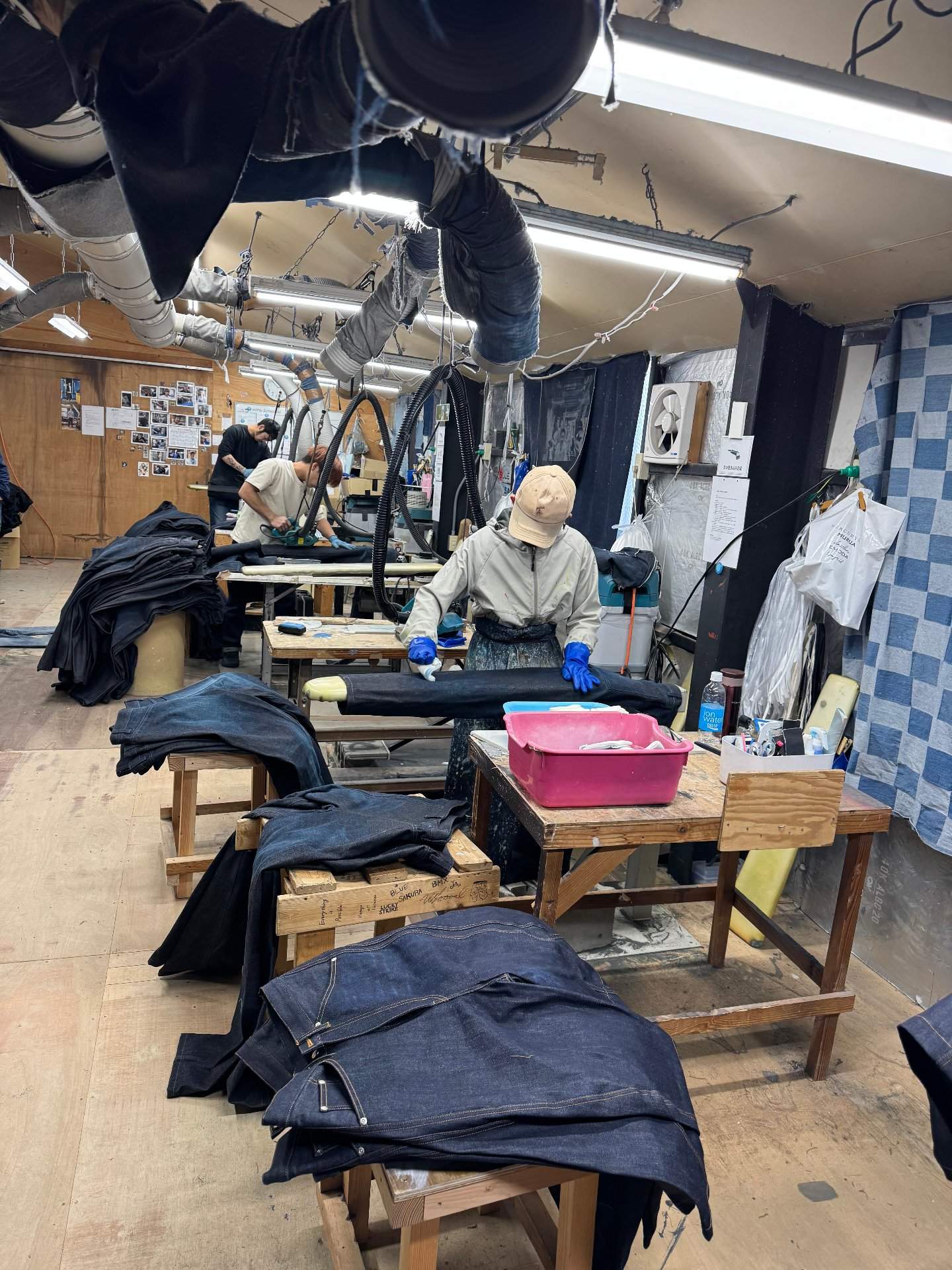 Sewing floor with denim garments in production